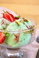 Ice cream strawberry-pistachio on napkin