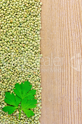 Lentils green on board on the left with parsley
