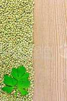 Lentils green on board on the left with parsley