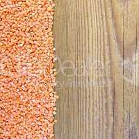 Lentils red on the board left