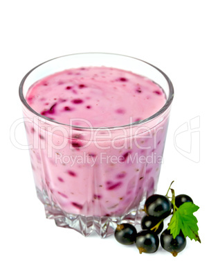 Milkshake with blackcurrants in glass