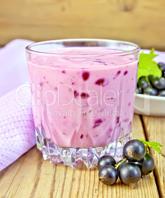 Milkshake with black currants with napkin