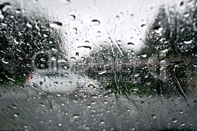 Raindrops with white car