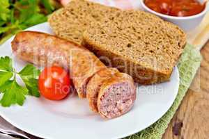 Sausages pork grilled in plate with bread on board