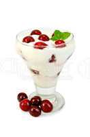 Yogurt thick with cherry in glass goblet