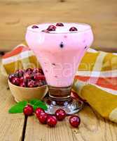 Yogurt thick with cranberries and mint on board