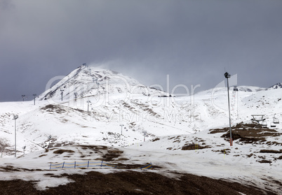 Ski slopes in little snow year at bad weather day