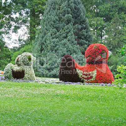 flowerbed in figures ducks