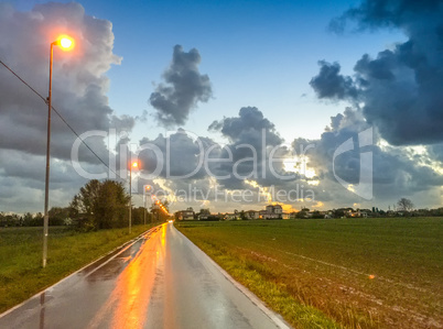 Wet road at sunset - Autumn colors at dusk
