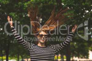 Young woman jumping in the park