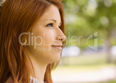 Pretty redhead calm in daydreaming