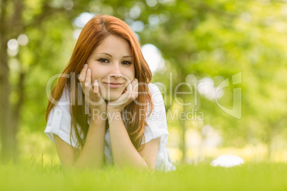 Portrait of a pretty redhead content