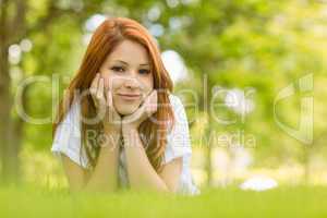 Portrait of a pretty redhead content