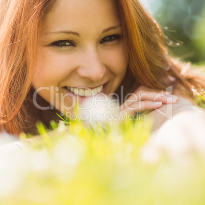 Portrait of a pretty redhead content