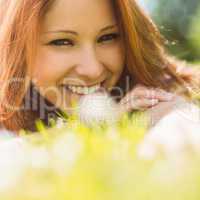 Portrait of a pretty redhead content