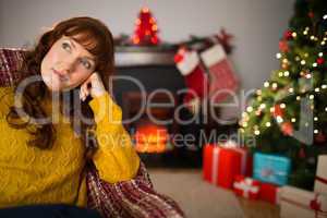 Beauty redhead thinking and relaxing at christmas
