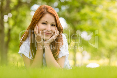 Portrait of a pretty redhead content