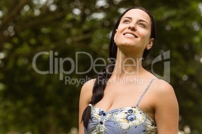 Portrait of a brunette enjoying the sunshine