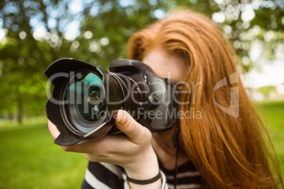 Female photographer at park Female photographer at park