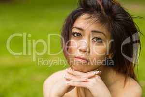 Portrait of beautiful woman in park