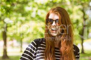 Happy beautiful woman wearing sunglasses