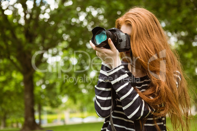 Female photographer at park