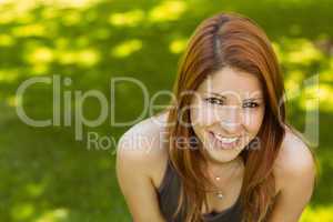 Portrait of a pretty redhead smiling