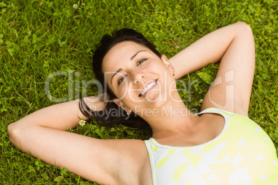 Relaxed fit brown hair lying on grass