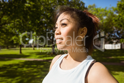 Healthy woman looking away in park