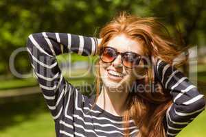 Beautiful young woman wearing sunglasses