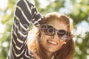 Beautiful young woman wearing sunglasses