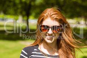 Beautiful young woman wearing sunglasses