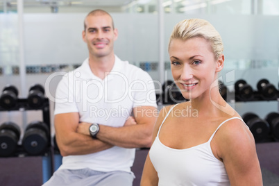 Portrait of a sporty couple at fitness studio