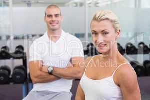 Portrait of a sporty couple at fitness studio