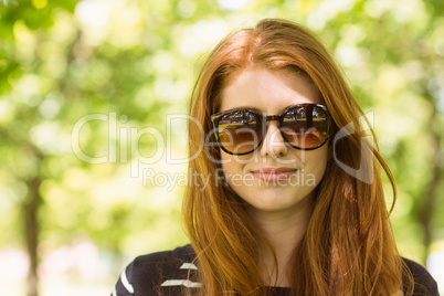 Beautiful young woman wearing sunglasses