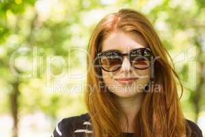 Beautiful young woman wearing sunglasses