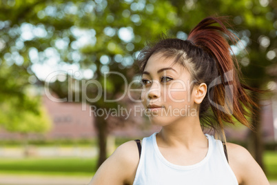 Healthy woman looking away in park