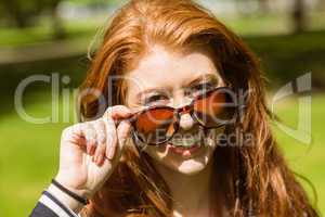 Beautiful young woman wearing sunglasses