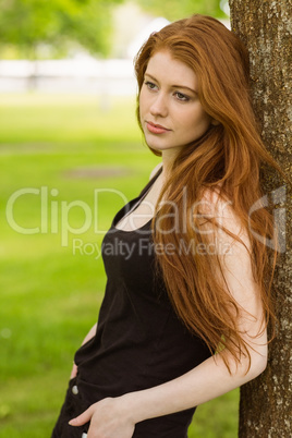 Side view of beautiful woman in park