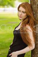 Side view of beautiful woman in park