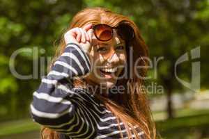 Beautiful young woman wearing sunglasses