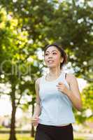 Healthy woman jogging in park
