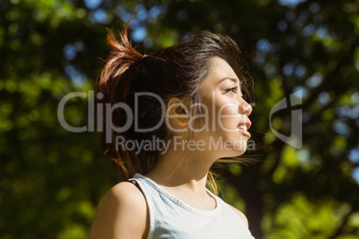 Side view of healthy woman in park