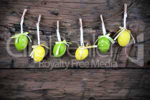 Six Green And Yellow Easter Eggs With Frame