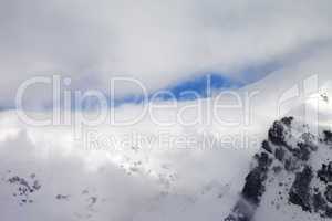 View on off-piste slope in clouds