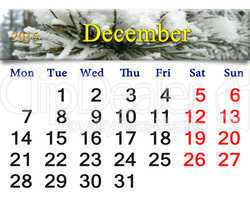 calendar for the December of 2015 with evergreen spruce