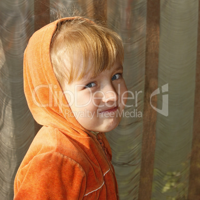 Cute little girl in orange hood