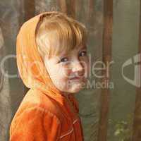 Cute little girl in orange hood