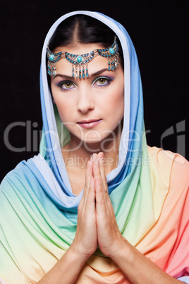 Portrait of young beautiful woman in oriental style