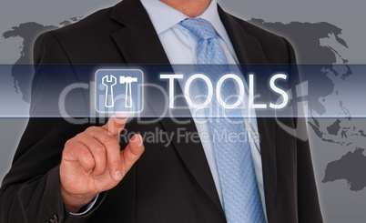 Tools - Businessman with touchscreen